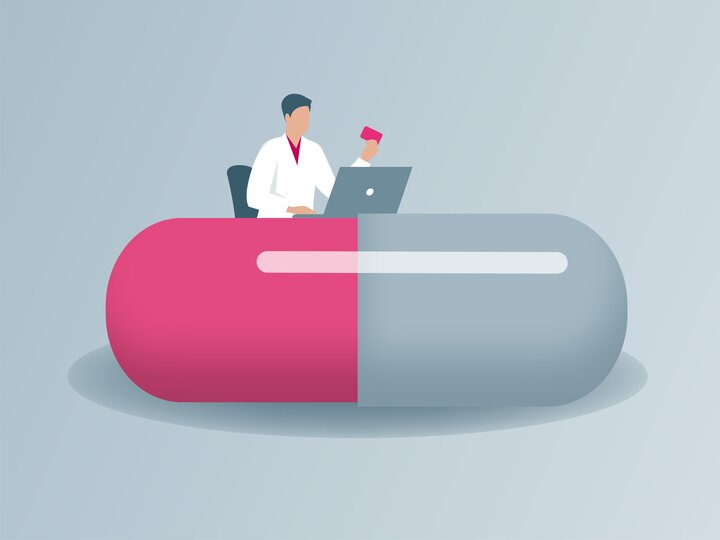 Grafik eines Arztes hinter einem Schreibtisch, der aussieht, wie eine überdimensionale Medikamentenkapsel